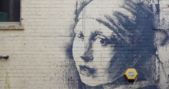 Banksy's "The Girl with the Pierced Eardrum" in Bristol