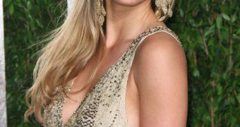 Bar Refaeli says she's proud of her “hard stomach” but would never deny herself the pleasures of food for it