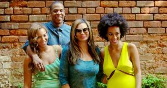 Beyonce, Solange, their mother and Jay Z pose for a happy family portrait days after the infamous elevator scuffle