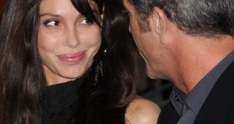 Back in happier times: Oksana Grigorieva and Mel Gibson on their first public outing as a couple