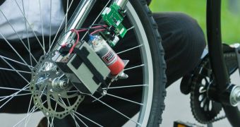 German scientist presenting prototype bike with wireless brakes