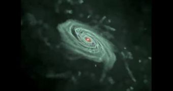 Snapshot from a computer model that simulates the formation of a spiral galaxy