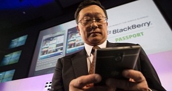 Chen holding the BlackBerry Passport