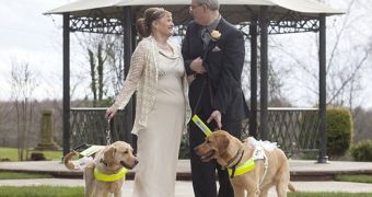 The happy couple and their dogs on their big day