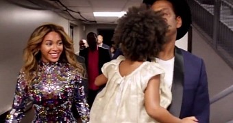 Blue Ivy and Jay Z congratulate Beyonce on a job well done at the VMAs 2014