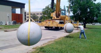 SwRI experts mimic asteroid collisions using two granite boulders and two, 40-foot cranes