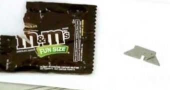 Child finds a razor in a bag of M&M's candy