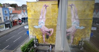 Artist creates mural showing a breakdancing Jesus