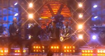 Bruno Mars and The Hooligans perform at the Brit Awards 2014