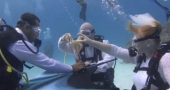 British couple exchange vows in an unusual underwater ceremony