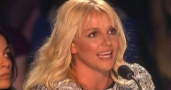 Britney Spears wore earplugs throughout the first live X Factor USA show