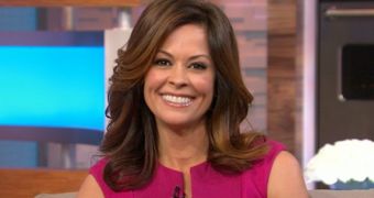 Brooke Burke-Charvet keeps a smiling face as she talks about disapointing DWTS firing