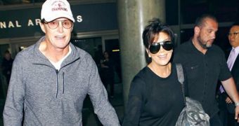 Kris and Bruce Jenner look ready for a reconciliation as they stroll hand in hand at LAX