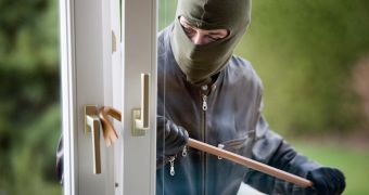 Two burglars enter a residence, search it for more than an hour without a tenant asleep on the couch waking up
