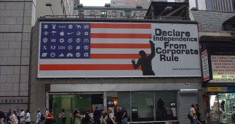 Adbusters ads are attracting more and more people worldwide. Here - a New York City billboard fighting corporate monopoly