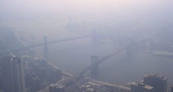 Smog covers the Brooklyn Bridge in New York.