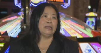 Casino janitor May Saelee has returned cash found in a restroom