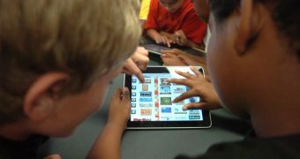Kids using iPads