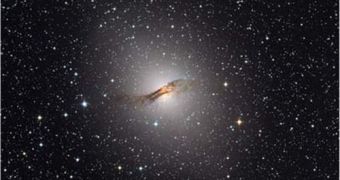 The central region of Centaurus A emtis both radio and extreme-energy gamma-ray radiation