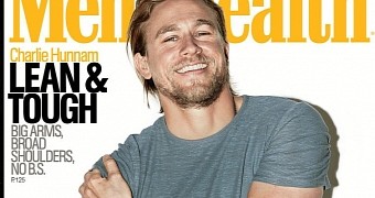 Charlie Hunnam shows off his muscles and megawatt smile on the December 2014 cover of Men’s Health