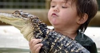 3-year-old enjoys playing with alligators and boa constrictors
