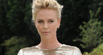 Charlize Theron is the queen of mean for not saying hi to Tia Mowry in spin class, Tia claims
