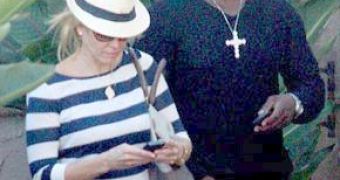 Chelsea Handler and 50 Cent try to keep a low profile on a date