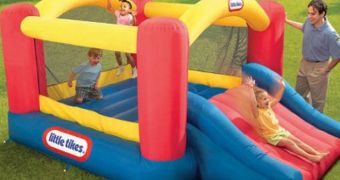 Three kids who were playing inside a bounce house were tossed out from the toy when strong winds lifted it into the air