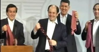 Government ministers from Chile taking off their ties for a good cause