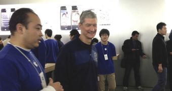 Tim Cook on a visit to one of his company's retail stores in Asia