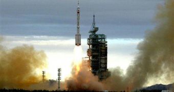 The Long March II F rocket carrying China's second manned spacecraft Shenzhou VI blasts off at the Jiuquan Satellite Launch Center in northwest China's Gansu Province on Wednesday October 12, 2005.