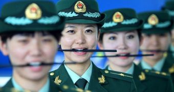 Customs police in Dalian, Liaoning Province, in China, are taught the art of smiling