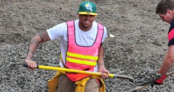 Chris Brown is pictured doing community service