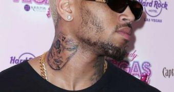 Chris Brown shows off new neck tattoo, causes quite a stir