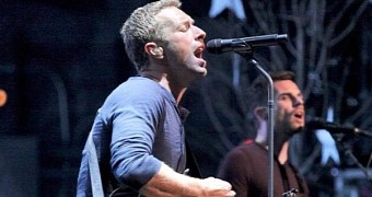 Chris Martin is wooing Jennifer Lawrence by writing music for her