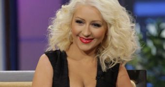 Christina Aguilera looks very toned and healthy in little black dress on Jay Leno