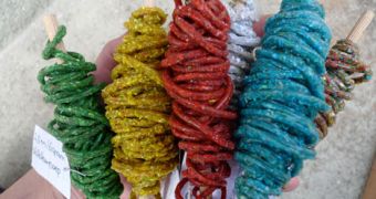 Threads of colored snail excrement used in making decorative tiles