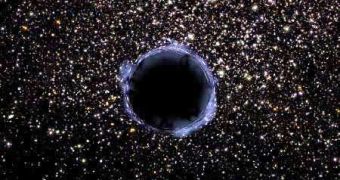 Artistic impression of a black hole against a stellar background