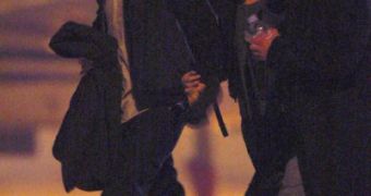 Robert Pattinson and Kristen Stewart caught holding hands at airport in Paris