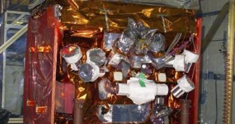 The Fermi telescope, visible here as the large silver "box" atop the satellite, has confirmed an anomalous antimatter signal in the cosmic ray spectrum