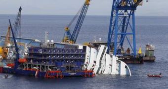 Hundreds work to get the Costa Concordia out of the water