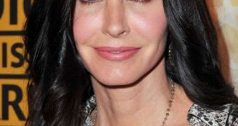 “Beauty over 40 is a slippery slope,” Courteney Cox says