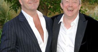 X Factor judges Simon Cowell and Louis Walsh come to blows on latest live show
