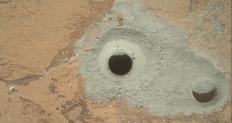 Curiosity has drilled deep enough to recover samples, to the left is the first test hole