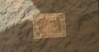 Curiosity Studies Its First Martian Rock