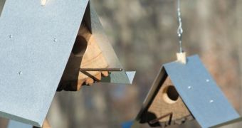 Birdhouses are made from reclaimed materials alone