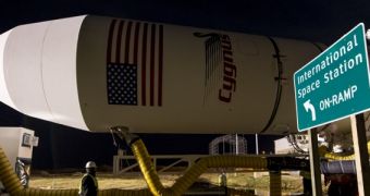 Antares rocket rolling to its launch pad on December 16, 2013
