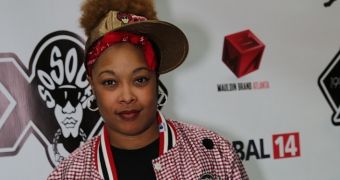 Rapper Da Brat seems amused by verdict in civil lawsuit, ordering her to pay a fortune to the woman she attacked in 2007