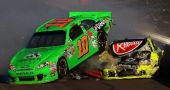 Danica Patrick crashes her car into a wall at the NASCAR Sprint Cup Subway 500