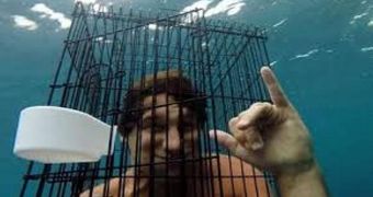 “Darwin Nominee” Goes Shark Swimming in Birdcage
